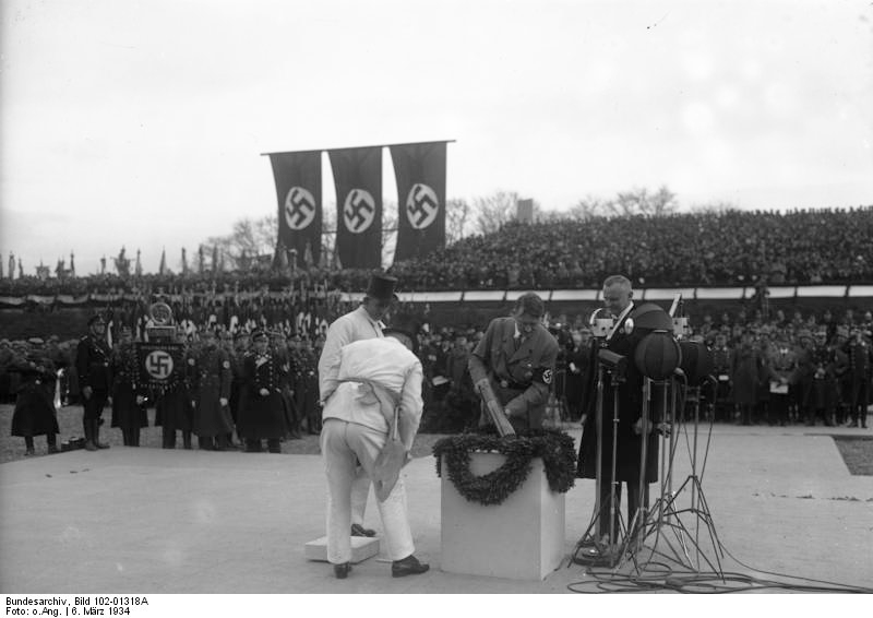 Hitler striking the first hammer blow on the cornerstone of the Richard Wagner National building in Leipzig